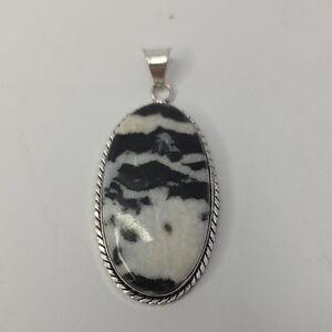 White Buffalo Turquoise pendant set in Silver Tone pendant